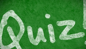 Schriftzug Quiz in weiß auf grünem Hintergrund